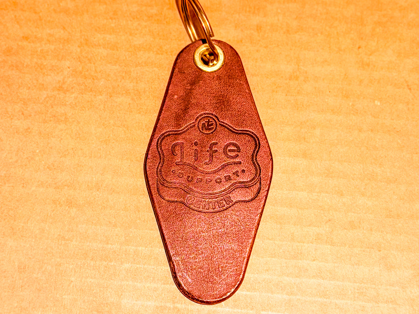 Hand‑Stamped Leather Key Fob – Classic Diamond‑Shaped Motel Key Design – Customizable Logo & Mink‑Oil Finish - Made In Wichita